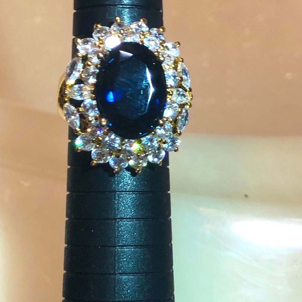 Rich Blue 7CT Topaz stone and White Topaz ring
